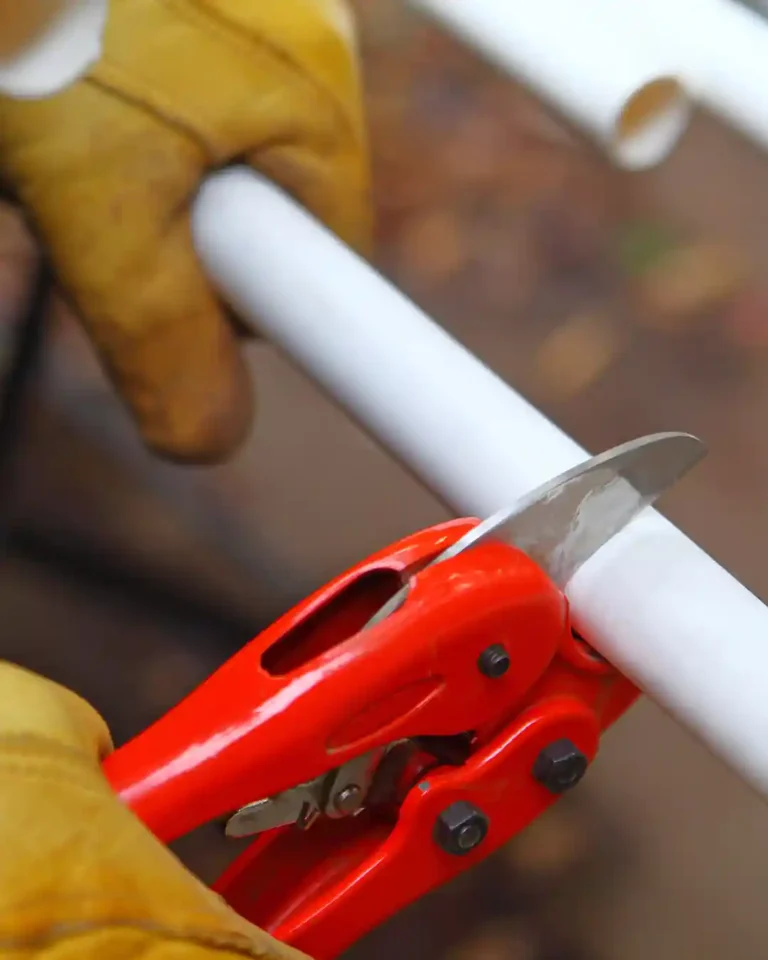 Osprey plumber cutting residential plumbing pipe
