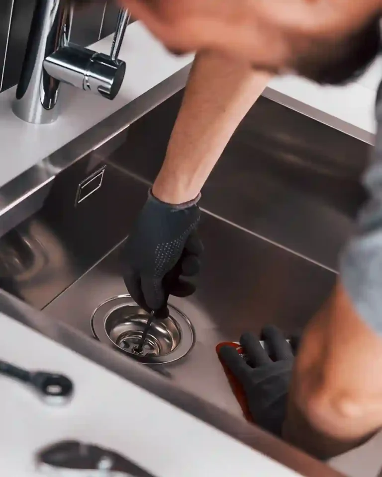 Restore plumber providing drain cleaning services.
